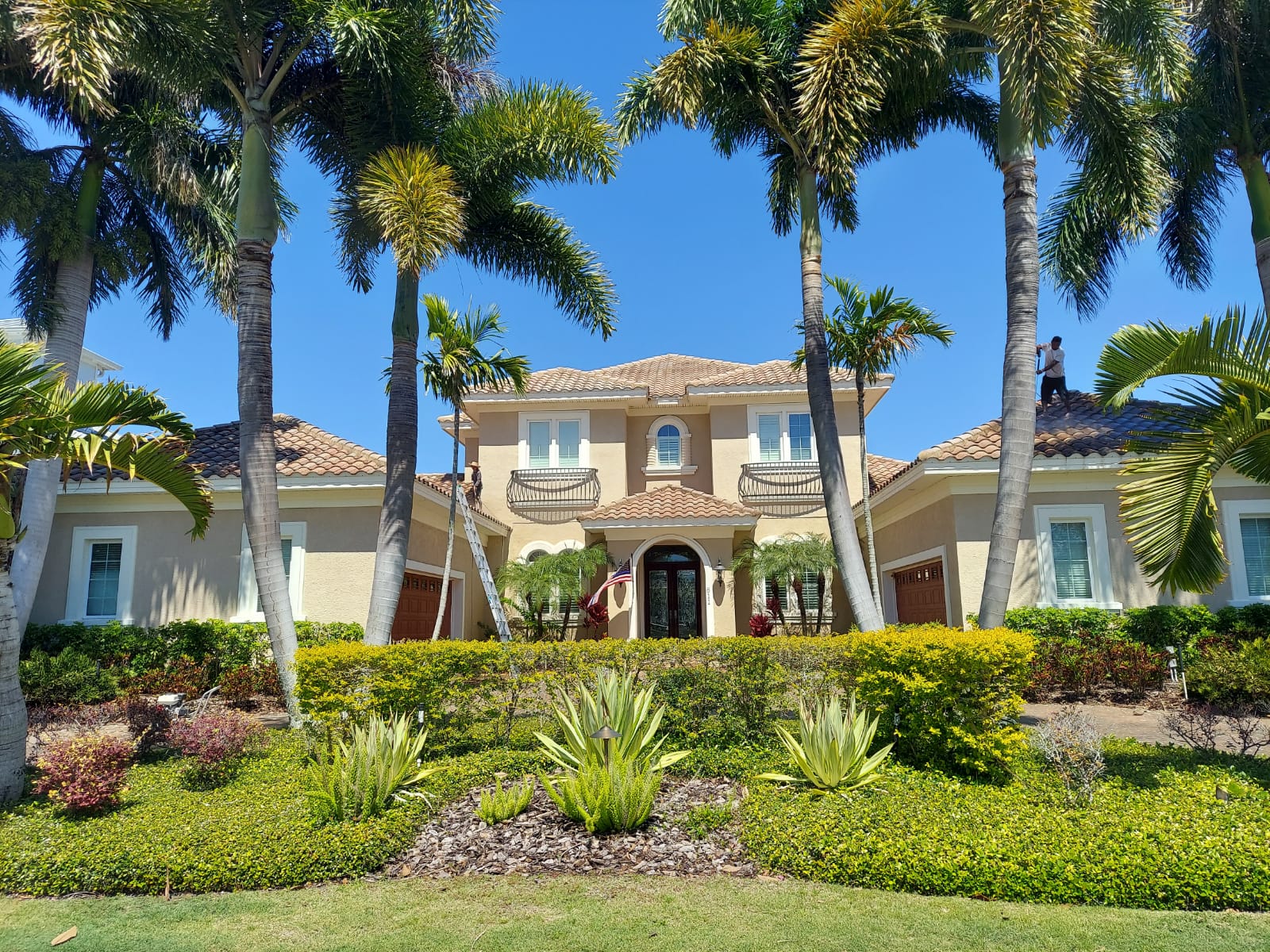 Bright white repainted tile roof on Florida home